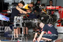 The Scuderia Toro Rosso STR10 is prepared in the pit garage. 26.03.2015. Formula 1 World Championship, Rd 2, Malaysian Grand Prix, Sepang, Malaysia, Thursday.