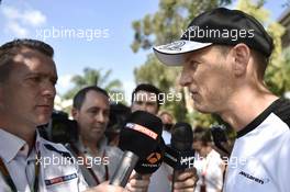 Jenson Button (GBR) McLaren with Craig Slater (GBR) Sky F1 Reporter. 26.03.2015. Formula 1 World Championship, Rd 2, Malaysian Grand Prix, Sepang, Malaysia, Thursday.