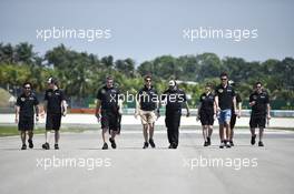 Romain Grosjean (FRA) Lotus F1 Team walks the circuit. 26.03.2015. Formula 1 World Championship, Rd 2, Malaysian Grand Prix, Sepang, Malaysia, Thursday.