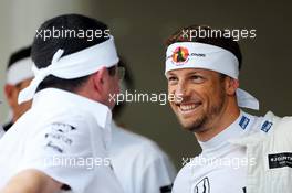 (L to R): Eric Boullier (FRA) McLaren Racing Director with Jenson Button (GBR) McLaren. 09.10.2015. Formula 1 World Championship, Rd 15, Russian Grand Prix, Sochi Autodrom, Sochi, Russia, Practice Day.