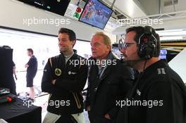 (L to R): Jolyon Palmer (GBR) Lotus F1 Team Test and Reserve Driver with father Jonathan Palmer (GBR) and Julien Simon-Chautemps (FRA) Lotus F1 Team Race Engineer. 09.10.2015. Formula 1 World Championship, Rd 15, Russian Grand Prix, Sochi Autodrom, Sochi, Russia, Practice Day.