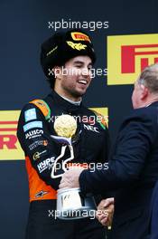 Sergio Perez (MEX) Sahara Force India F1 celebrates his third position on the podium. 11.10.2015. Formula 1 World Championship, Rd 15, Russian Grand Prix, Sochi Autodrom, Sochi, Russia, Race Day.