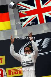 Race winner Lewis Hamilton (GBR) Mercedes AMG F1 celebrates on the podium. 11.10.2015. Formula 1 World Championship, Rd 15, Russian Grand Prix, Sochi Autodrom, Sochi, Russia, Race Day.