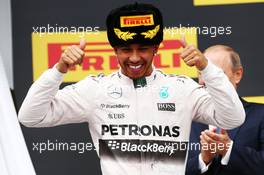 Race winner Lewis Hamilton (GBR) Mercedes AMG F1 celebrates on the podium. 11.10.2015. Formula 1 World Championship, Rd 15, Russian Grand Prix, Sochi Autodrom, Sochi, Russia, Race Day.