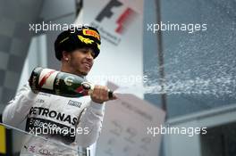 Race winner Lewis Hamilton (GBR) Mercedes AMG F1 celebrates on the podium. 11.10.2015. Formula 1 World Championship, Rd 15, Russian Grand Prix, Sochi Autodrom, Sochi, Russia, Race Day.