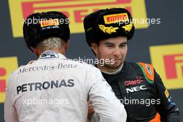 Lewis Hamilton (GBR), Mercedes AMG F1 Team and Sergio Perez (MEX), Sahara Force India  11.10.2015. Formula 1 World Championship, Rd 15, Russian Grand Prix, Sochi Autodrom, Sochi, Russia, Race Day.