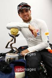 Sergio Perez (MEX) Sahara Force India F1 celebrates his third position. 11.10.2015. Formula 1 World Championship, Rd 15, Russian Grand Prix, Sochi Autodrom, Sochi, Russia, Race Day.