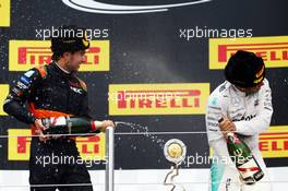 (L to R): Sergio Perez (MEX) Sahara Force India F1 celebrates his third position on the podium with race winner Lewis Hamilton (GBR) Mercedes AMG F1. 11.10.2015. Formula 1 World Championship, Rd 15, Russian Grand Prix, Sochi Autodrom, Sochi, Russia, Race Day.