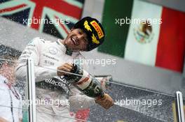 Race winner Lewis Hamilton (GBR) Mercedes AMG F1 celebrates on the podium. 11.10.2015. Formula 1 World Championship, Rd 15, Russian Grand Prix, Sochi Autodrom, Sochi, Russia, Race Day.