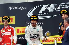 The podium (L to R): Sebastian Vettel (GER) Ferrari, second; Lewis Hamilton (GBR) Mercedes AMG F1, race winner; Sergio Perez (MEX) Sahara Force India F1, third. 11.10.2015. Formula 1 World Championship, Rd 15, Russian Grand Prix, Sochi Autodrom, Sochi, Russia, Race Day.