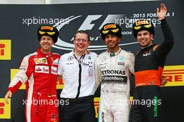 The podium (L to R): Sebastian Vettel (GER) Ferrari, second; Lewis Hamilton (GBR) Mercedes AMG F1, race winner; Sergio Perez (MEX) Sahara Force India F1, third. 11.10.2015. Formula 1 World Championship, Rd 15, Russian Grand Prix, Sochi Autodrom, Sochi, Russia, Race Day.