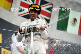 Race winner Lewis Hamilton (GBR) Mercedes AMG F1 celebrates on the podium. 11.10.2015. Formula 1 World Championship, Rd 15, Russian Grand Prix, Sochi Autodrom, Sochi, Russia, Race Day.