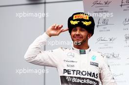 Race winner Lewis Hamilton (GBR) Mercedes AMG F1 celebrates on the podium. 11.10.2015. Formula 1 World Championship, Rd 15, Russian Grand Prix, Sochi Autodrom, Sochi, Russia, Race Day.