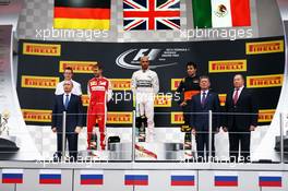 The podium (L to R): Sebastian Vettel (GER) Ferrari, second; Lewis Hamilton (GBR) Mercedes AMG F1, race winner; Sergio Perez (MEX) Sahara Force India F1, third. 11.10.2015. Formula 1 World Championship, Rd 15, Russian Grand Prix, Sochi Autodrom, Sochi, Russia, Race Day.