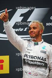 Race winner Lewis Hamilton (GBR) Mercedes AMG F1 celebrates on the podium. 11.10.2015. Formula 1 World Championship, Rd 15, Russian Grand Prix, Sochi Autodrom, Sochi, Russia, Race Day.