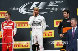 The podium (L to R): Sebastian Vettel (GER) Ferrari, second; Lewis Hamilton (GBR) Mercedes AMG F1, race winner; Sergio Perez (MEX) Sahara Force India F1, third. 11.10.2015. Formula 1 World Championship, Rd 15, Russian Grand Prix, Sochi Autodrom, Sochi, Russia, Race Day.