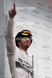 Race winner Lewis Hamilton (GBR) Mercedes AMG F1 celebrates on the podium. 11.10.2015. Formula 1 World Championship, Rd 15, Russian Grand Prix, Sochi Autodrom, Sochi, Russia, Race Day.