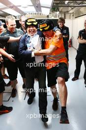 Antonio Perez (MEX) celebrates third position for his son Sergio Perez (MEX) Sahara Force India F1 with Neil Dickie (GBR) Sahara Force India F1 Team. 11.10.2015. Formula 1 World Championship, Rd 15, Russian Grand Prix, Sochi Autodrom, Sochi, Russia, Race Day.