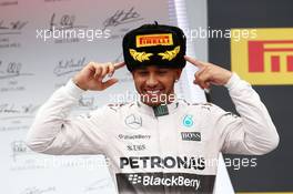 Race winner Lewis Hamilton (GBR) Mercedes AMG F1 celebrates on the podium. 11.10.2015. Formula 1 World Championship, Rd 15, Russian Grand Prix, Sochi Autodrom, Sochi, Russia, Race Day.