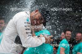 Race winner Lewis Hamilton (GBR) Mercedes AMG F1 celebrates with the team. 11.10.2015. Formula 1 World Championship, Rd 15, Russian Grand Prix, Sochi Autodrom, Sochi, Russia, Race Day.