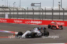 Valtteri Bottas (FIN) Williams FW37 leads Kimi Raikkonen (FIN) Ferrari SF15-T. 11.10.2015. Formula 1 World Championship, Rd 15, Russian Grand Prix, Sochi Autodrom, Sochi, Russia, Race Day.