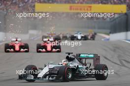 Lewis Hamilton (GBR) Mercedes AMG F1 W06 leads the battling Sebastian Vettel (GER) Ferrari SF15-T and Kimi Raikkonen (FIN) Ferrari SF15-T. 11.10.2015. Formula 1 World Championship, Rd 15, Russian Grand Prix, Sochi Autodrom, Sochi, Russia, Race Day.