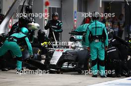 Lewis Hamilton (GBR) Mercedes AMG F1 W06 makes a pit stop. 11.10.2015. Formula 1 World Championship, Rd 15, Russian Grand Prix, Sochi Autodrom, Sochi, Russia, Race Day.