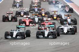 (L to R): Nico Rosberg (GER) Mercedes AMG F1 W06 and team mate Lewis Hamilton (GBR) Mercedes AMG F1 W06 lead at the start of the race. 11.10.2015. Formula 1 World Championship, Rd 15, Russian Grand Prix, Sochi Autodrom, Sochi, Russia, Race Day.