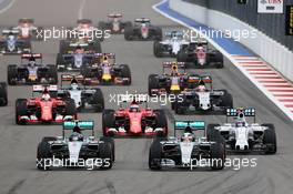 (L to R): Nico Rosberg (GER) Mercedes AMG F1 W06 and team mate Lewis Hamilton (GBR) Mercedes AMG F1 W06 lead at the start of the race. 11.10.2015. Formula 1 World Championship, Rd 15, Russian Grand Prix, Sochi Autodrom, Sochi, Russia, Race Day.