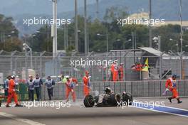 The damaged Lotus F1 E23 of Romain Grosjean (FRA) Lotus F1 Team after he crashed in the race. 11.10.2015. Formula 1 World Championship, Rd 15, Russian Grand Prix, Sochi Autodrom, Sochi, Russia, Race Day.