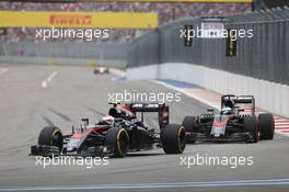 Jenson Button (GBR) McLaren MP4-30 leads team mate Fernando Alonso (ESP) McLaren MP4-30. 11.10.2015. Formula 1 World Championship, Rd 15, Russian Grand Prix, Sochi Autodrom, Sochi, Russia, Race Day.