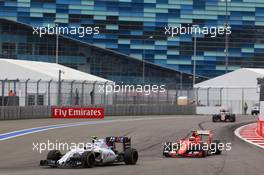 Valtteri Bottas (FIN) Williams FW37 leads Kimi Raikkonen (FIN) Ferrari SF15-T. 11.10.2015. Formula 1 World Championship, Rd 15, Russian Grand Prix, Sochi Autodrom, Sochi, Russia, Race Day.