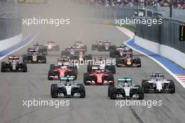 (L to R): Nico Rosberg (GER) Mercedes AMG F1 W06 and team mate Lewis Hamilton (GBR) Mercedes AMG F1 W06 lead at the start of the race. 11.10.2015. Formula 1 World Championship, Rd 15, Russian Grand Prix, Sochi Autodrom, Sochi, Russia, Race Day.