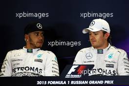 (L to R): Lewis Hamilton (GBR) Mercedes AMG F1 and team mate Nico Rosberg (GER) Mercedes AMG F1 in the post qualifying FIA Press Conference. 10.10.2015. Formula 1 World Championship, Rd 15, Russian Grand Prix, Sochi Autodrom, Sochi, Russia, Qualifying Day.