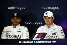 (L to R): Lewis Hamilton (GBR) Mercedes AMG F1 and team mate Nico Rosberg (GER) Mercedes AMG F1 in the post qualifying FIA Press Conference. 10.10.2015. Formula 1 World Championship, Rd 15, Russian Grand Prix, Sochi Autodrom, Sochi, Russia, Qualifying Day.