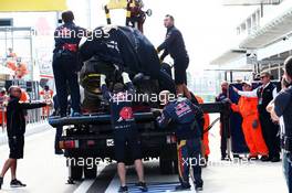 The Scuderia Toro Rosso STR10 of Carlos Sainz Jr (ESP) Scuderia Toro Rosso is recovered back to the pits on the back of a truck after he crashed in the third practice session. 10.10.2015. Formula 1 World Championship, Rd 15, Russian Grand Prix, Sochi Autodrom, Sochi, Russia, Qualifying Day.