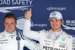 Valtteri Bottas (FIN), Williams F1 Team and Nico Rosberg (GER), Mercedes AMG F1 Team  10.10.2015. Formula 1 World Championship, Rd 15, Russian Grand Prix, Sochi Autodrom, Sochi, Russia, Qualifying Day.