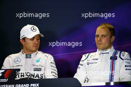 (L to R): Nico Rosberg (GER) Mercedes AMG F1 and Valtteri Bottas (FIN) Williams in the post qualifying FIA Press Conference. 10.10.2015. Formula 1 World Championship, Rd 15, Russian Grand Prix, Sochi Autodrom, Sochi, Russia, Qualifying Day.