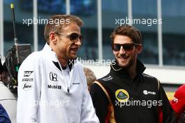 (L to R): Jenson Button (GBR) McLaren and Romain Grosjean (FRA) Lotus F1 Team on the drivers parade. 11.10.2015. Formula 1 World Championship, Rd 15, Russian Grand Prix, Sochi Autodrom, Sochi, Russia, Race Day.