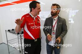 (L to R): Gianluca Pisanello (ITA) Manor Marussia F1 Team Chief Engineer with Timo Glock (GER). 11.10.2015. Formula 1 World Championship, Rd 15, Russian Grand Prix, Sochi Autodrom, Sochi, Russia, Race Day.