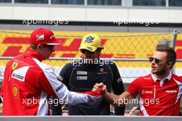 (L to R): Kimi Raikkonen (FIN) Ferrari with Felipe Nasr (BRA) Sauber F1 Team and Will Stevens (GBR) Manor Marussia F1 Team on the drivers parade. 11.10.2015. Formula 1 World Championship, Rd 15, Russian Grand Prix, Sochi Autodrom, Sochi, Russia, Race Day.