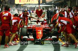 Sebastian Vettel (GER) Ferrari SF15-T practices a pit stop. 18.09.2015. Formula 1 World Championship, Rd 13, Singapore Grand Prix, Singapore, Singapore, Practice Day.