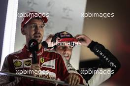 Race winner Sebastian Vettel (GER) Ferrari on the podium. 20.09.2015. Formula 1 World Championship, Rd 13, Singapore Grand Prix, Singapore, Singapore, Race Day.