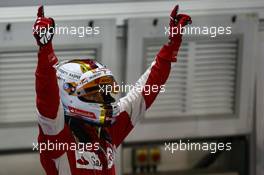 1st place Sebastian Vettel (GER) Ferrari SF15-T. 20.09.2015. Formula 1 World Championship, Rd 13, Singapore Grand Prix, Singapore, Singapore, Race Day.