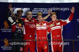 1st place Sebastian Vettel (GER) Ferrari SF15-T, 2nd place Daniel Ricciardo (AUS) Red Bull Racing RB11 and 3rd place Kimi Raikkonen (FIN) Ferrari SF15-T. 20.09.2015. Formula 1 World Championship, Rd 13, Singapore Grand Prix, Singapore, Singapore, Race Day.