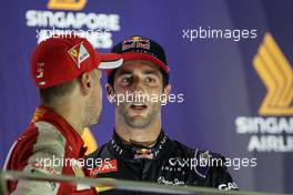 The podium (L to R): Race winner Sebastian Vettel (GER) Ferrari with second placed Daniel Ricciardo (AUS) Red Bull Racing. 20.09.2015. Formula 1 World Championship, Rd 13, Singapore Grand Prix, Singapore, Singapore, Race Day.