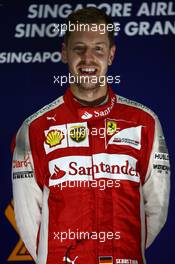 1st place Sebastian Vettel (GER) Ferrari SF15-T. 20.09.2015. Formula 1 World Championship, Rd 13, Singapore Grand Prix, Singapore, Singapore, Race Day.