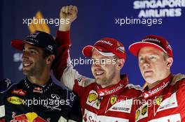 The podium (L to R): Daniel Ricciardo (AUS) Red Bull Racing, second; Sebastian Vettel (GER) Ferrari, race winner; Kimi Raikkonen (FIN) Ferrari, third. 20.09.2015. Formula 1 World Championship, Rd 13, Singapore Grand Prix, Singapore, Singapore, Race Day.