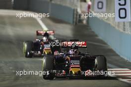 Max Verstappen (NLD) Scuderia Toro Rosso STR10 leads team mate Carlos Sainz Jr (ESP) Scuderia Toro Rosso STR10. 20.09.2015. Formula 1 World Championship, Rd 13, Singapore Grand Prix, Singapore, Singapore, Race Day.