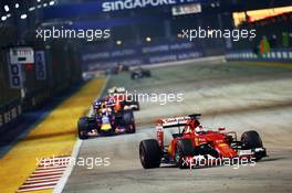 Sebastian Vettel (GER) Ferrari SF15-T. 20.09.2015. Formula 1 World Championship, Rd 13, Singapore Grand Prix, Singapore, Singapore, Race Day.